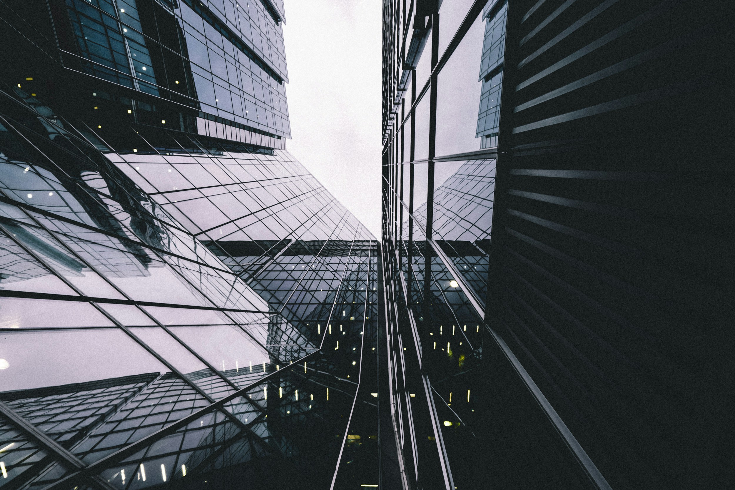 Reflections across the glass architecture of Canary Wharf, London