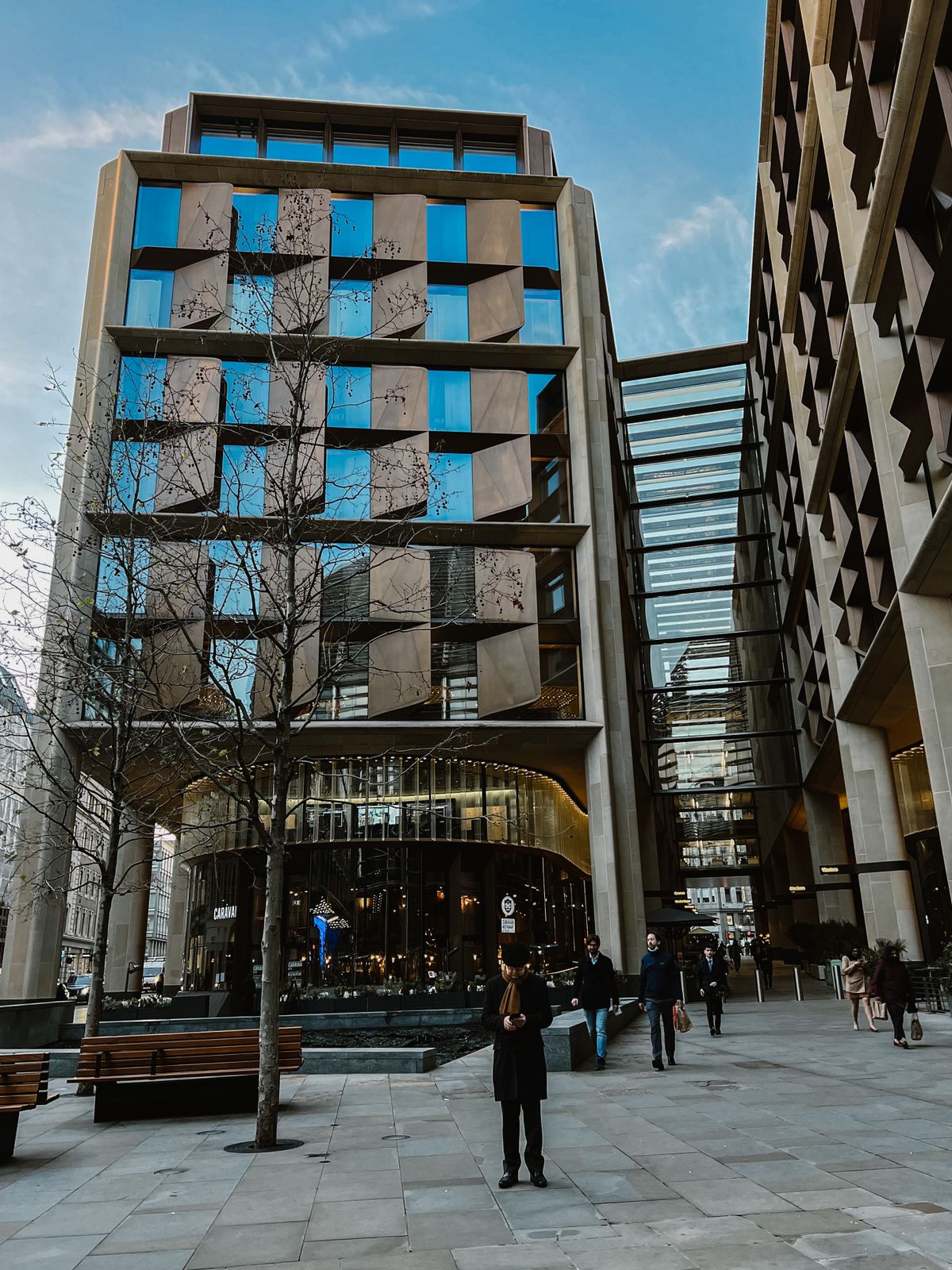 Sculptural bronze panels on a London building